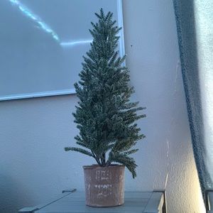 Fake small decorative Christmas tree